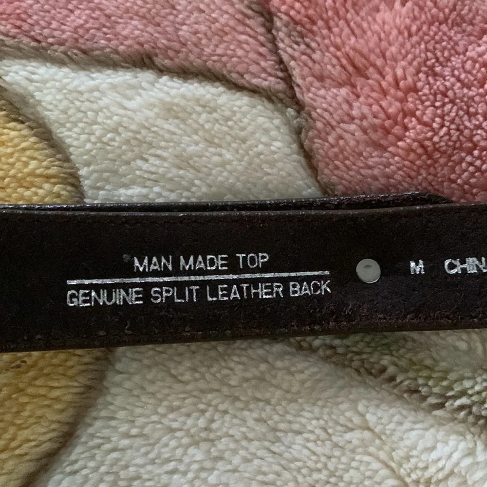 Genuine leather man made belt size small medium western cowboy